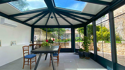 veranda 16 avec puits de lumière et toit trois pentes