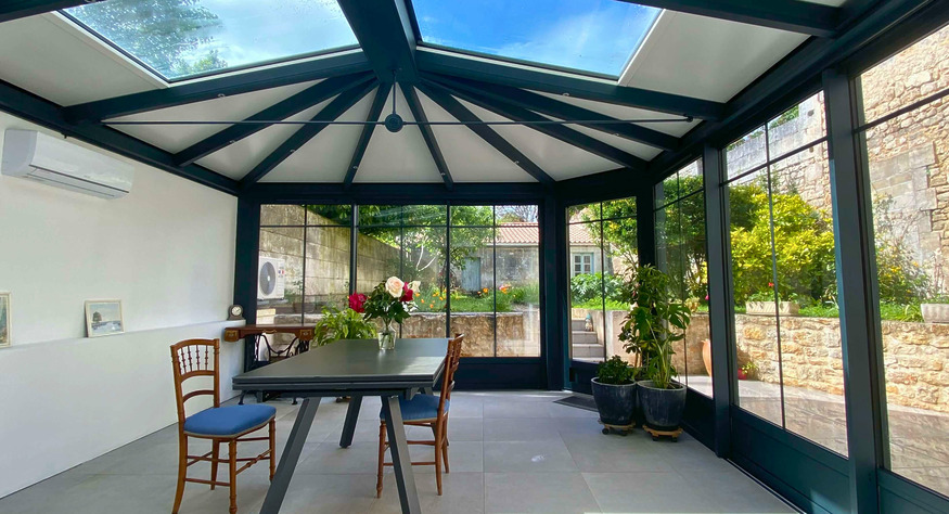 veranda 16 avec puits de lumière et toit trois pentes
